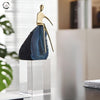 Golden Person Sitting On Crystal Figurine
