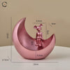 Interstellar Girl Sitting Tabletop Figurine