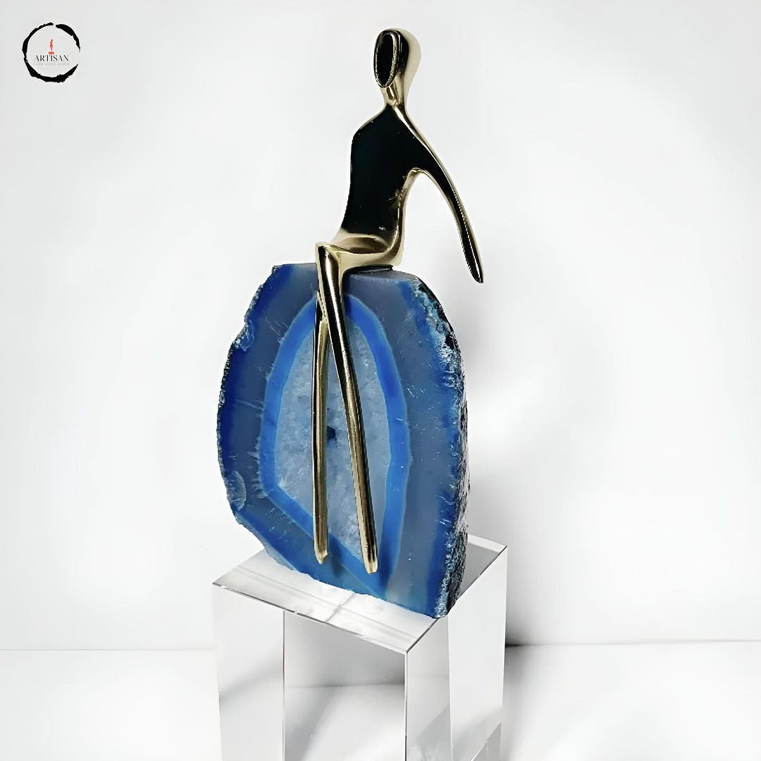 Golden Person Sitting On Crystal Figurine